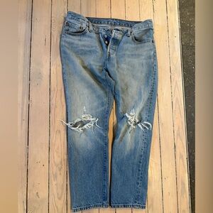 Levi’s 501 with distressed knees